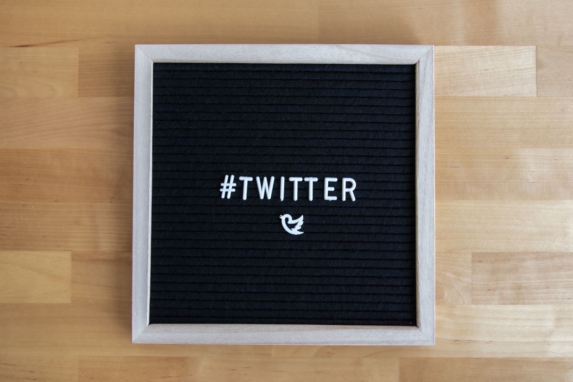 Black letter board with #Twitter hashtag and bird icon, ideal for social media themes. — How to Create Effective White Label